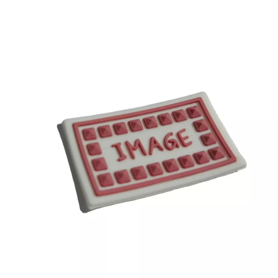Les labels de silicone ont adapté les corrections aux besoins du client 3D en caoutchouc chaleur le transfert lavable pour le vêtement