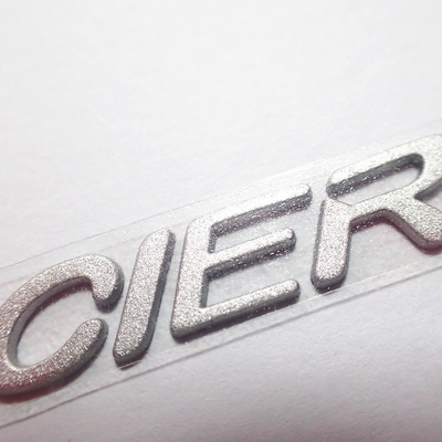 Les labels adaptés aux besoins du client d'habillement de transfert de chaleur du silicone 3D avec de l'argent Shinny la couleur