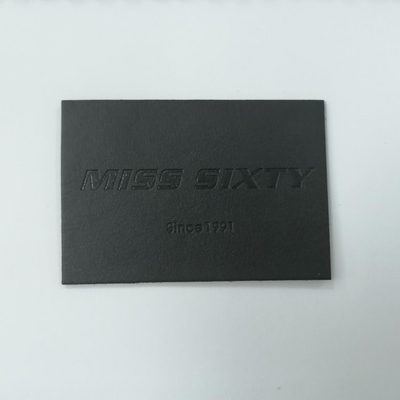 Le label lavable a gravé l'unité centrale en refief en cuir de Microfiber de suède de corrections