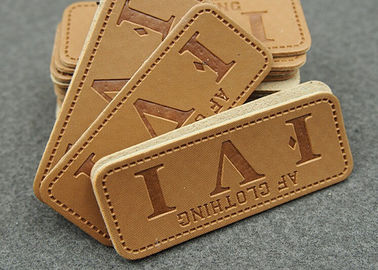 L'habillement fait sur commande durable raccorde les corrections en cuir pour le logo de jeans imprimable