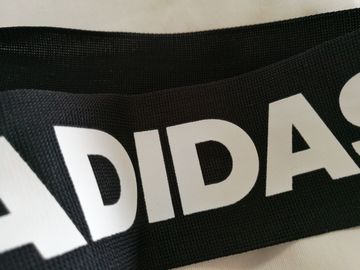 Customiezd 3D a soulevé le label d'impression d'écran pour la caractéristique lavable de bande de Farbic