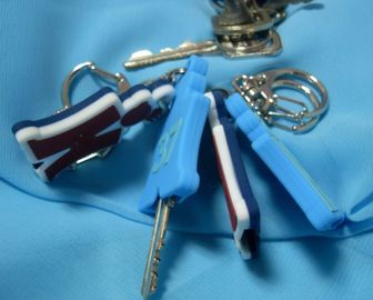 Les cadeaux promotionnels personnalisés par nouveauté ont imprimé PVC Keychain de logo avec la lumière de LED