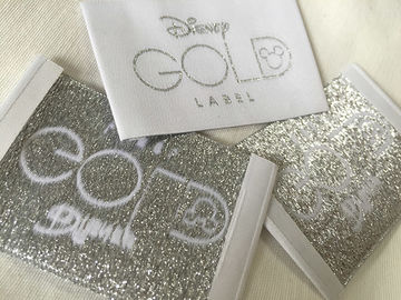 L'habillement tissé par pli d'extrémité de Bage d'or de Disney marque la coupe froide/coupe de la chaleur