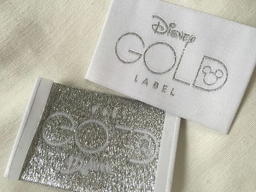 L'habillement tissé par pli d'extrémité de Bage d'or de Disney marque la coupe froide/coupe de la chaleur