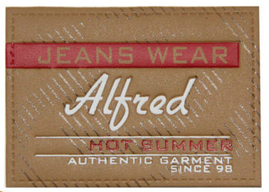 Les jeans de relief faits sur commande personnalisés de correction en cuir garnissent en cuir le label de correction pour l'habillement