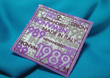 Le matériel de silicone conçoivent le label en fonction du client de tissu de PVC, les corrections 3D décoratives pour des vestes