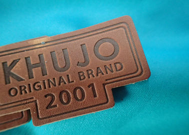 Labels véritables personnalisés et étiquettes de cuir de relief de logo en métal pour des vêtements