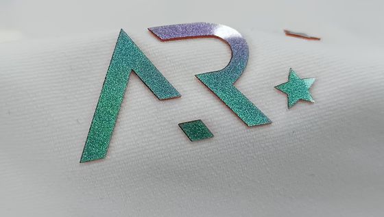 Logo OEKOTEX Patches lavables personnalisés Badges en silicone argent reflet