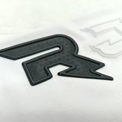 Étiquette imprimée sur mesure en TPU 3D noir en relief étiquette de presse à chaleur TPU pour Jersey