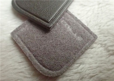 Nègre - le cuir de relief veiné par Brown raccorde le logo à haute fréquence de marque cousant sur le vêtement