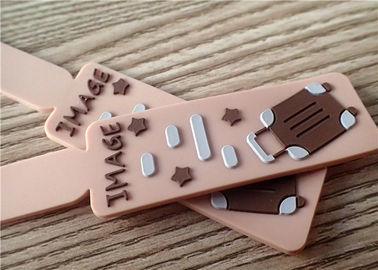 Les corrections faites sur commande professionnelles de silicium avec la gravure en relief 3D réunissent le logo pour le bagage