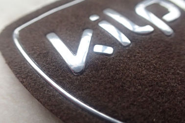 Le cuir de relief fait sur commande de transfert de chaleur raccorde le logo 3D sur le suède, labels des vêtements TPU