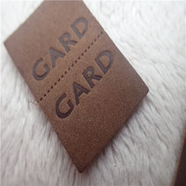 Label tissé de cuir de relief avec les points à tiret commodes au mi pli