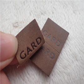 Label tissé de cuir de relief avec les points à tiret commodes au mi pli