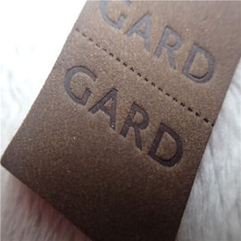 Label tissé de cuir de relief avec les points à tiret commodes au mi pli