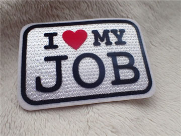 L'habillement fait sur commande élégant raccorde l'AMOUR du logo I de slogan MA peluche du TRAVAIL s'assemblant chromatiquement