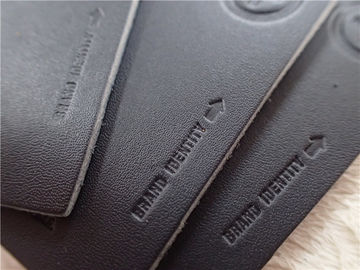 Logo à haute fréquence sur des corrections de cuir d'unité centrale pour les jeans OEKO à la mode