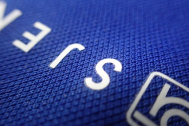 Corrections claires de transfert de chaleur d'impression d'écran en soie de logo d'encre pour l'usage du football