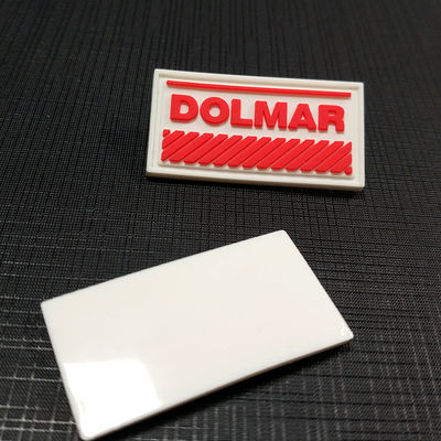 L'étiquette du fabriquant faite sur commande de Sweatsuit étiquette le PVC du drapeau 3D d'insigne raccorde pour l'habillement
