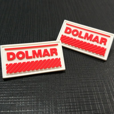 L'étiquette du fabriquant faite sur commande de Sweatsuit étiquette le PVC du drapeau 3D d'insigne raccorde pour l'habillement