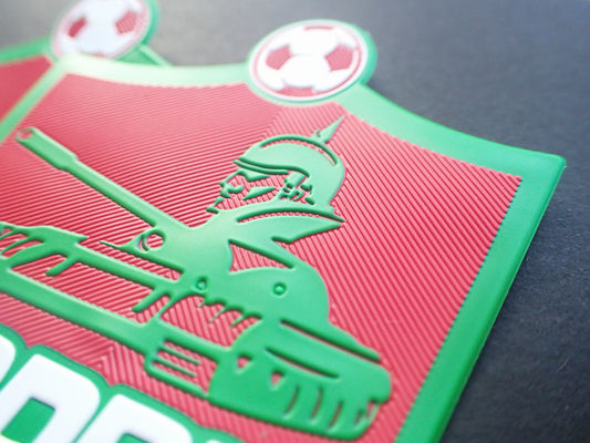 le logo TPU de sports du football 3D a gravé des corrections en refief pour les vêtements extérieurs