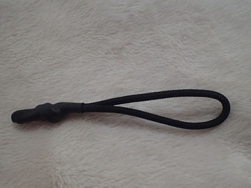 Extracteur noir de tirette avec la corde en nylon avec la fin en caoutchouc pour le vêtement, sac